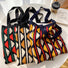 Three polyester fiber knitted tote bags with geometric contrast color patterns.