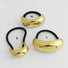 Angled view of  gold Gleaming Curve Hair Cuff in different sizes , ideal for quick updos and ponytails.