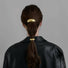 Model wearing two gold  Gleaming Curve Hair Cuffs , great for everyday styling and gifting.