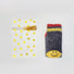 One Gold Dot Gift Bag in small size with one pair of socks, showing the size comparation.