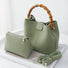 Sage green bucket bag set including a detachable crossbody strap and an independent inner pouch.