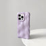 Light purple aesthetic phone case featuring a melting 3D wave design and flexible silicone.