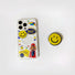 Model holding Happy Stickers Case. Built-in magnetic holder with playful graphics on high-quality acrylic.
