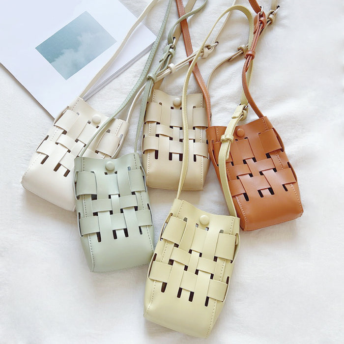 Five PU leather crossbody bags in white, mint green, cream, light yellow, and brown with a hollow woven design.