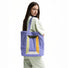 Model carrying a Hued Panel Corduroy Tote Bag, easy for commuting and weekends.