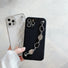 Model holding Irregular Metal Chain Case. Striking metallic attachment on a protective silicone frame.