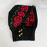 Front view of Jacquard Knitted Balaclava in black, featuring an intricate natural wool knit for sleek winter gear.