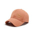 Front view of Joyful Grin Cap in orange, displays iconic smile graphic on breathable cotton for high-visibility style.