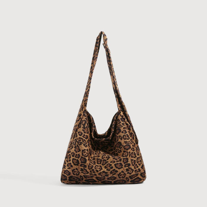 Large slouchy tote bag featuring a classic brown and black leopard print.