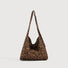 Large slouchy tote bag featuring a classic brown and black leopard print.