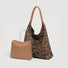 Leopard print suede hobo bag shown with its matching removable inner pouch.