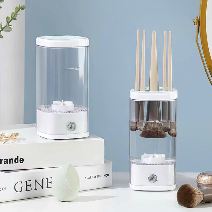 White and clear ABS automatic makeup brush cleaner with brushes inside, next to a similar empty unit.