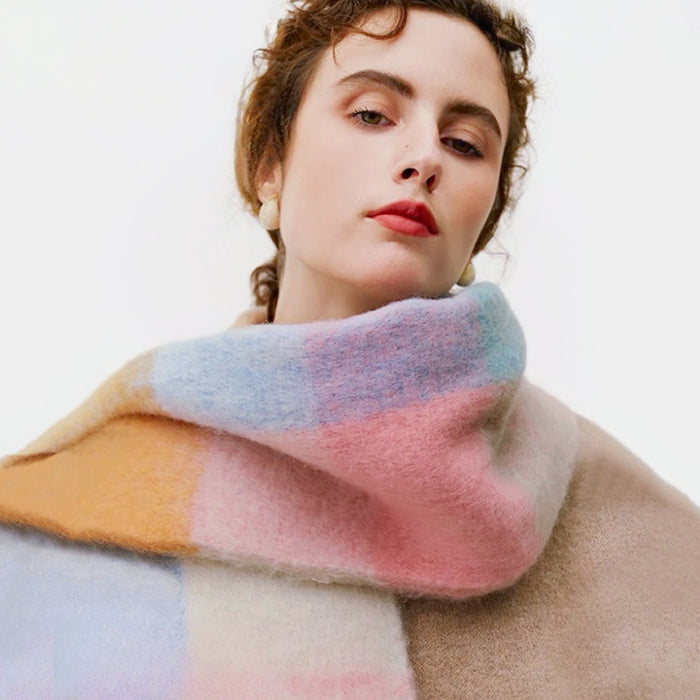 Close-up of the oversized gradient plaid scarf worn by model.