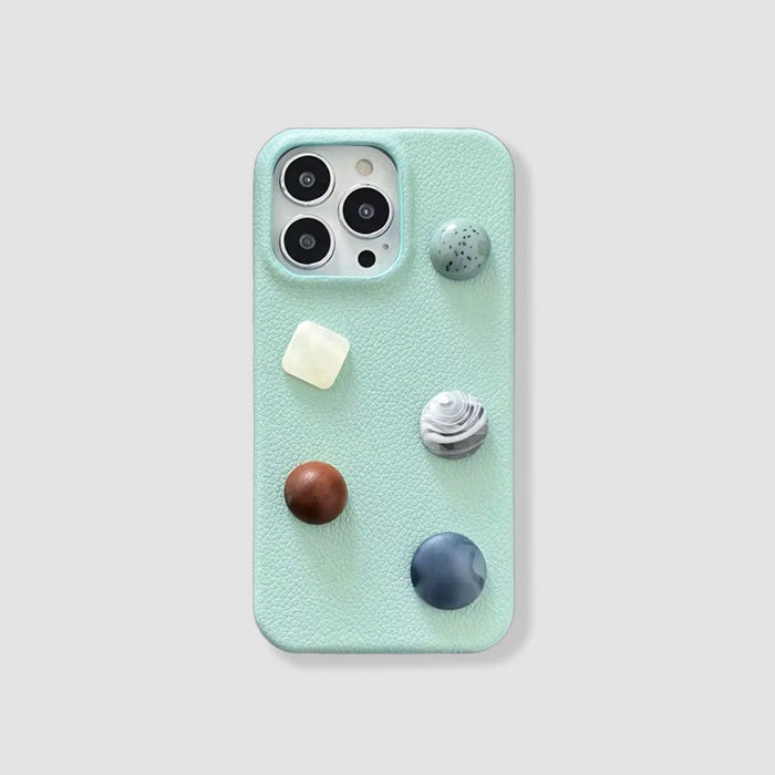 Mint jewel PU leather iPhone case with assorted decorative stone-like embellishments. Vintage luxe style.