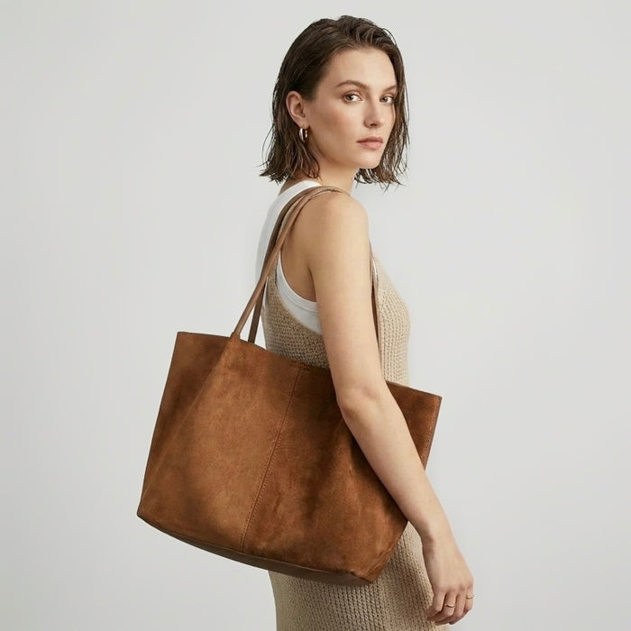 Modern Muse Suede Tote in Caramel- Model shot showing minimalist style - Premium laptop bag for women.