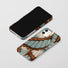 Magical shimmering aesthetic Morpho Flair Case, presenting a color-shifting butterfly design in the light.