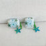 Close-up of two Oceanic Star Charm Airpods Case Cover, ideal for gifting and everyday use.
