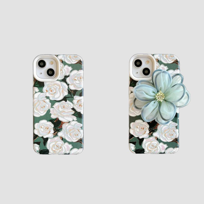 Dark green silicone case with white oil painting roses and a light blue 3D flower accent.
