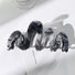 Folded view of Painted Wave Hair Clawn in black, ideal for quick updos and ponytails.