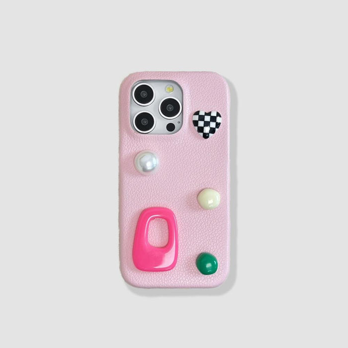 Pink PU leather case with checkered heart, pearl, and colorful candy charms.