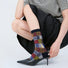 Model wearing a pair of black plaid cotton socks, ideal for everyday outfits and sneakers.