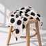 Lightweight black and beige polka dot silk scarf product view.