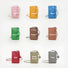 Flat lay of Polycolor Hanging Ball Leather Bag in 9 colors.