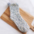 Close-up of Pompom Cupcake Socks in gray, ideal for workouts and commuting.