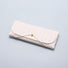 Folded view of white Portable Woven Leather Glasses Case with elastic rope closure, easy for travel packing.