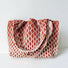 Close-up of Ripple Texture Tote Bag in rust red, ideal for errands and gifting.