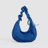 Close-up of Ruched Strap Suede Hobo Bag in blue, easy for commuting and weekends.