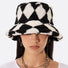 Black and white sherpa diamond check bucket hat, crafted from soft polyester in a sophisticated cozy style.