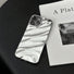 Front view of Silver Glossy Wave Case. High-gloss futuristic wave effect on flexible silicone.