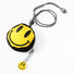Angled smiley coin purse with charm; round zip pouch and adjustable lanyard for keys or quick errands.