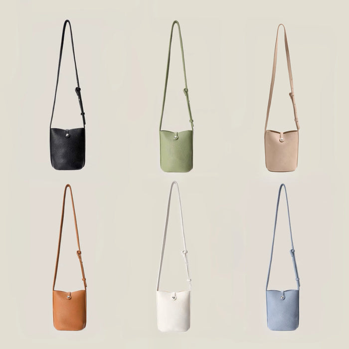 Display showing the crossbody bag in 6 colors, including black, green, khaki, white, blue and brown.
