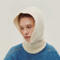 Model wearing the beige knitted balaclava , highlighting the soft ribbed knit texture.
