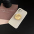 Front view of cream beige phone case. Clean utilitarian aesthetic with a functional metallic stand.