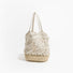 Front view of Spiral Pattern Hollow Crochet Bag in white, ideal for errands and gifting.