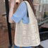 Model carrying a cream white Square Pattern Crochet Bag on shoulder, easy for commuting and weekends.