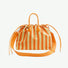 Flat lay of the orange and white striped bowling bag; vibrant colorway perfect for summer Street Style accents.