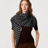 Model wearing Grey and black striped wool triangle scarf shawl, easy for weekend styling and gifting.