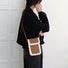 Model carrying a brown Suede Crossbody Bag With Plush Trim as crossbody, ideal for city walks and gifting.