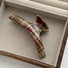 Angled view of  arc Tartan Elegance Hair Claw, great for everyday styling and gifting.