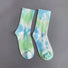 Angled view of Tie Dye Cotton Socks in blue and green, great for daily wear and lounging.
