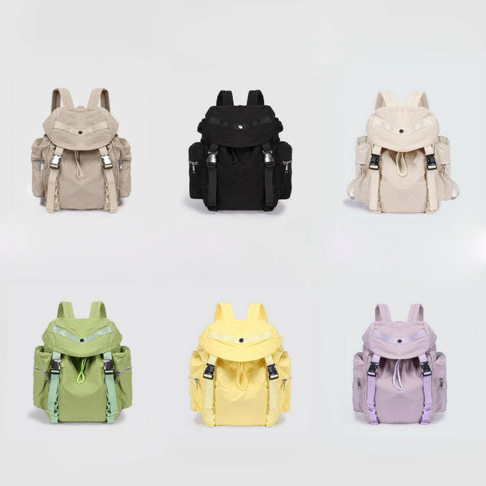 Six polyester Ultralight Urban Daily Backpacks in beige, black, cream, green, yellow, and lavender.