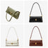 Four vintage baguette shoulder bags in PU leather: sage green, black, white, and brown, each with a gold clasp.