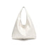 Classic white waxed leather hobo bag showing its soft and slouchy shape.