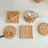 Angled view of 5 pieces of Wooden Biscuit Coasters, great for home decor and gifting.