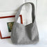 Folded view of Woolish Cozy Tote Bag in gray, easy for commuting and weekends.