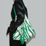 Model carrying a green white Zebra Print Knitted Tote Bag on shoulder, ideal for city walks and gifting.